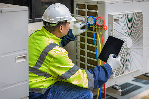 Professional Air Conditioning Repair technician working in Waverly, MI